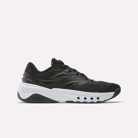 The Reebok Men's ERS Training Shoes in black feature premium cushioning and a thick white sole with circular cut-outs, displayed in a side view on a plain white background.