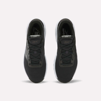 A pair of Reebok Men's ERS Training Shoes with black uppers, white soles, and gray accents on the tongue and sides are shown side by side on a plain white background, offering premium cushioning for comfort.