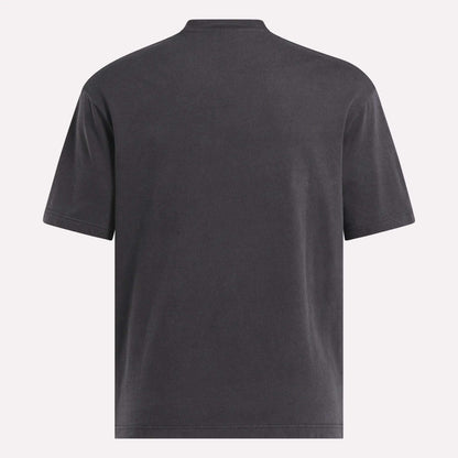 The Reebok x MARKET Graphic T-Shirt, shown from the back in dark gray with short sleeves, stands out against a light background—perfect for a minimalist streetwear vibe.