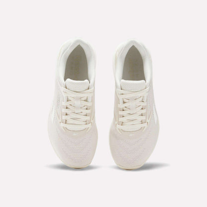 The Reebok Women's Nano X5 Training Shoes are a stylish white option designed for women's everyday workouts and casual wear.