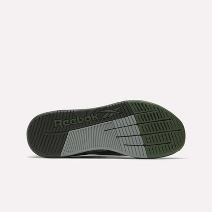 Bottom view of the Reebok Nano X5 Training Shoes outsole, showcasing black, gray, and olive green sections with grooves and an embossed Reebok logo near the heel.