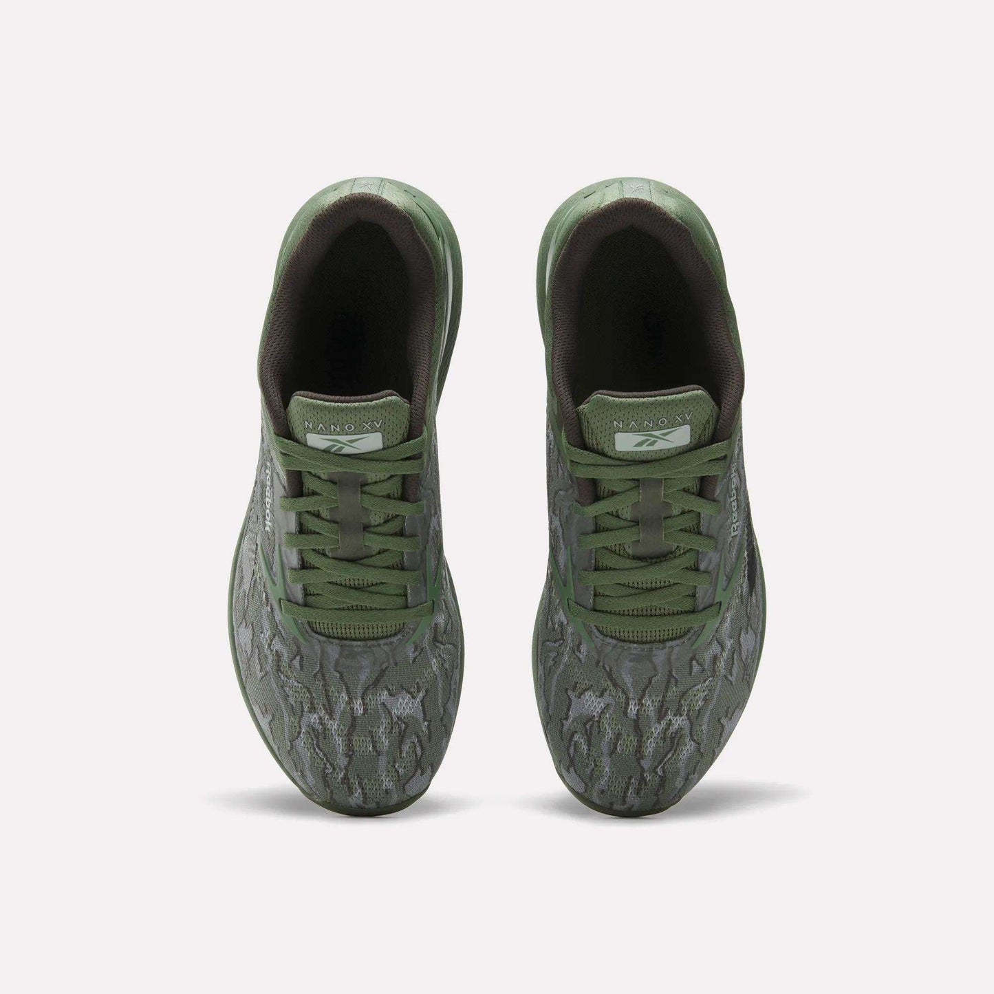 Top view of Reebok Nano X5 Training Shoes for men with green patterned uppers, matching laces, and dark green interiors—these stylish and comfortable pairs are shown side by side on a plain white background.