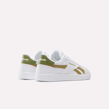 The Reebok Smash Edge Shoes, in white with green and gold accents and a suede T-toe, are displayed on a plain white background. The left shoe is angled to reveal the back and side; the right shows a side profile.