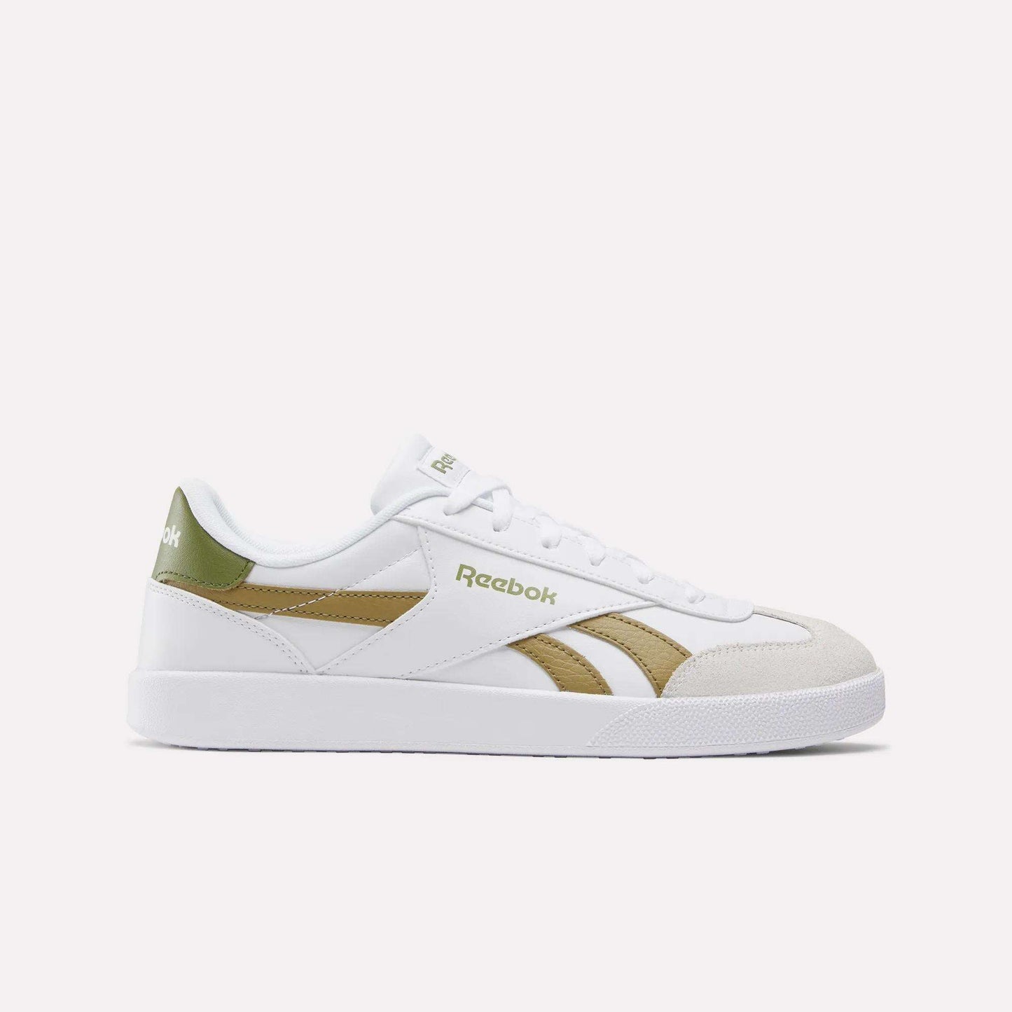 The Smash Edge Shoes are white Reebok sneakers with green and gold accents, featuring a suede T-toe, side logo, white laces, and a flat white sole—classic indoor soccer-inspired style shown on a plain light background.