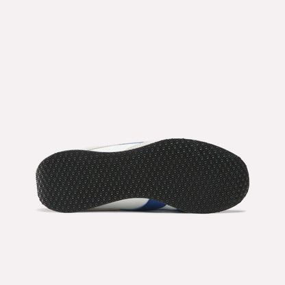 The image displays the bottom view of Reebok R400 Shoes, featuring a black textured rubber sole, set against a plain white background.