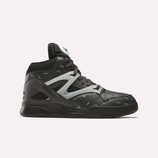 The Reebok Pump Omni Zone II Retro Basketball Shoes feature a black high-top design with gray and reflective accents, a white Reebok logo on the tongue, patterned upper with light gray details, and a black sole.