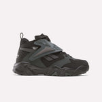The Reebok Preseason 94 Retro Basketball Shoes, in black and dark gray with a chunky sole and mesh overlays, are shown in side profile on a white background—perfect for training sessions.