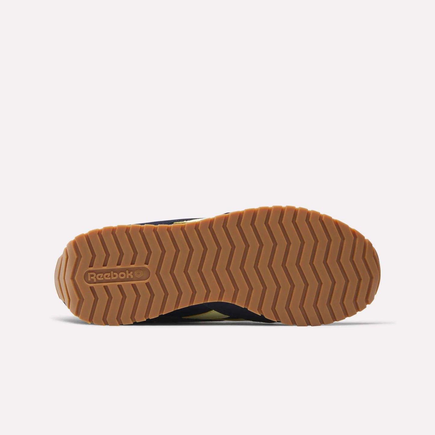 A close-up of the Women's Classic AZ Shoes by Reebok, showcasing their timeless design and retro-inspired details.