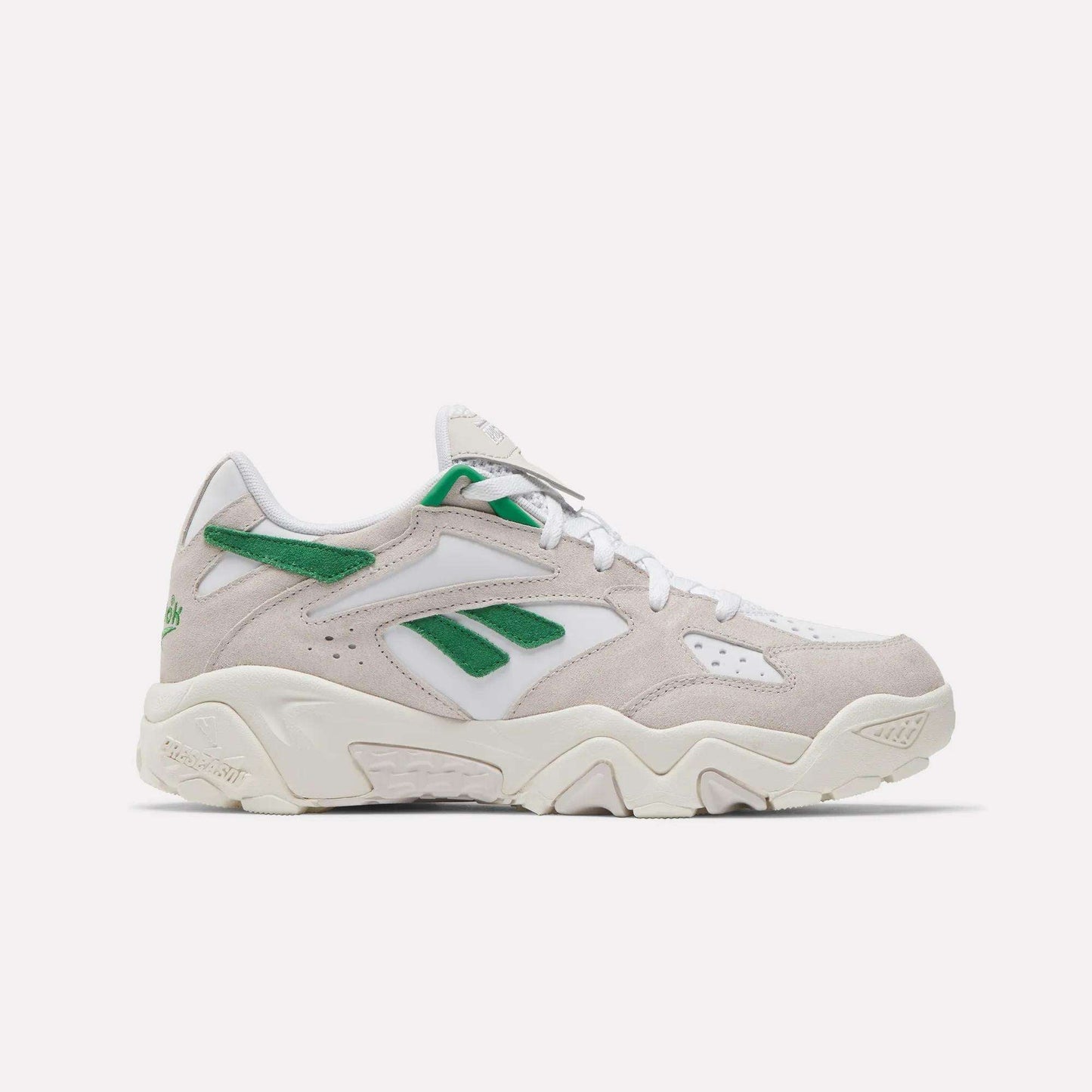 The Reebok Preseason 94 Low Retro Basketball Shoes feature a beige and white design with green accents, a chunky sole, and Reebok logos on the side and heel, inspired by '90s archive styles and shown against a plain white background.