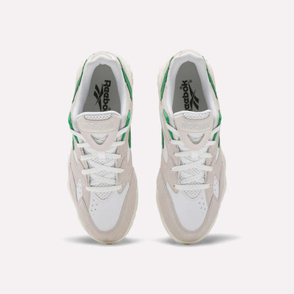 A top view of Reebok Preseason 94 Low Retro Basketball Shoes in white with beige suede and green accents, inspired by '90s athletic styles, displayed on a plain light background.