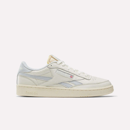 Side view of Reebok Club C Revenge Vintage Shoes in white full-grain leather with light gray accents, cream-colored sole, and subtle side branding, displayed against a plain white background.