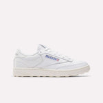 The Men's Club C Golf Shoes by Reebok are white, low-top sneakers with the Reebok logo and Union Jack on the side, water-resistant leather, white laces, and a textured off-white spikeless outsole, shown against a plain light background.
