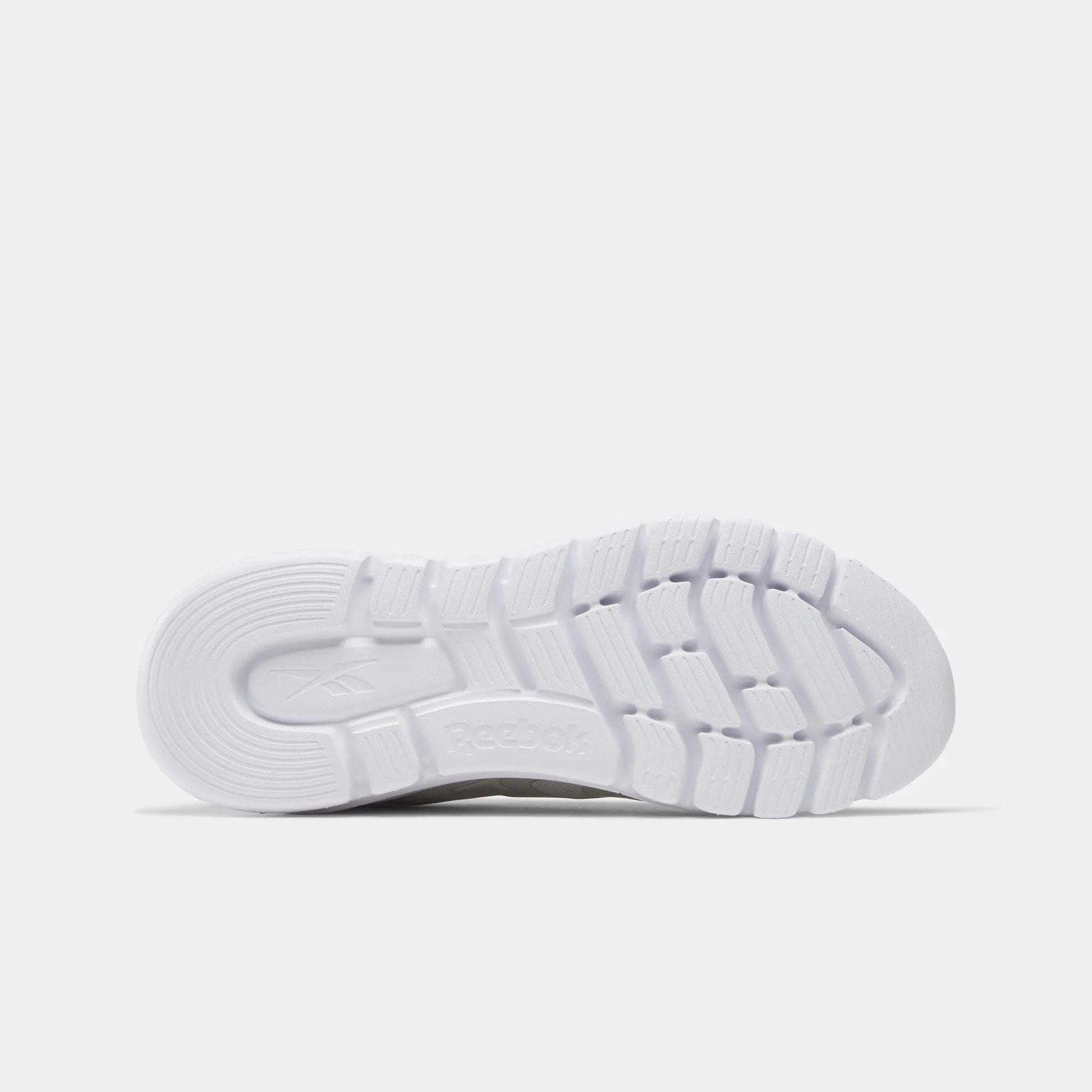 The Reebok Men's Split Flex Training Shoes feature a white design with a matching sole, ideal for training sessions or HIIT classes.