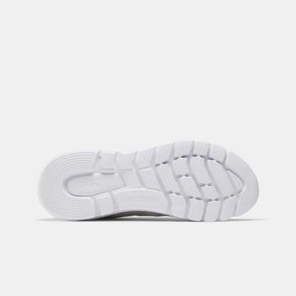 The Reebok Men's Split Flex Training Shoes feature a white design with a matching sole, ideal for training sessions or HIIT classes.