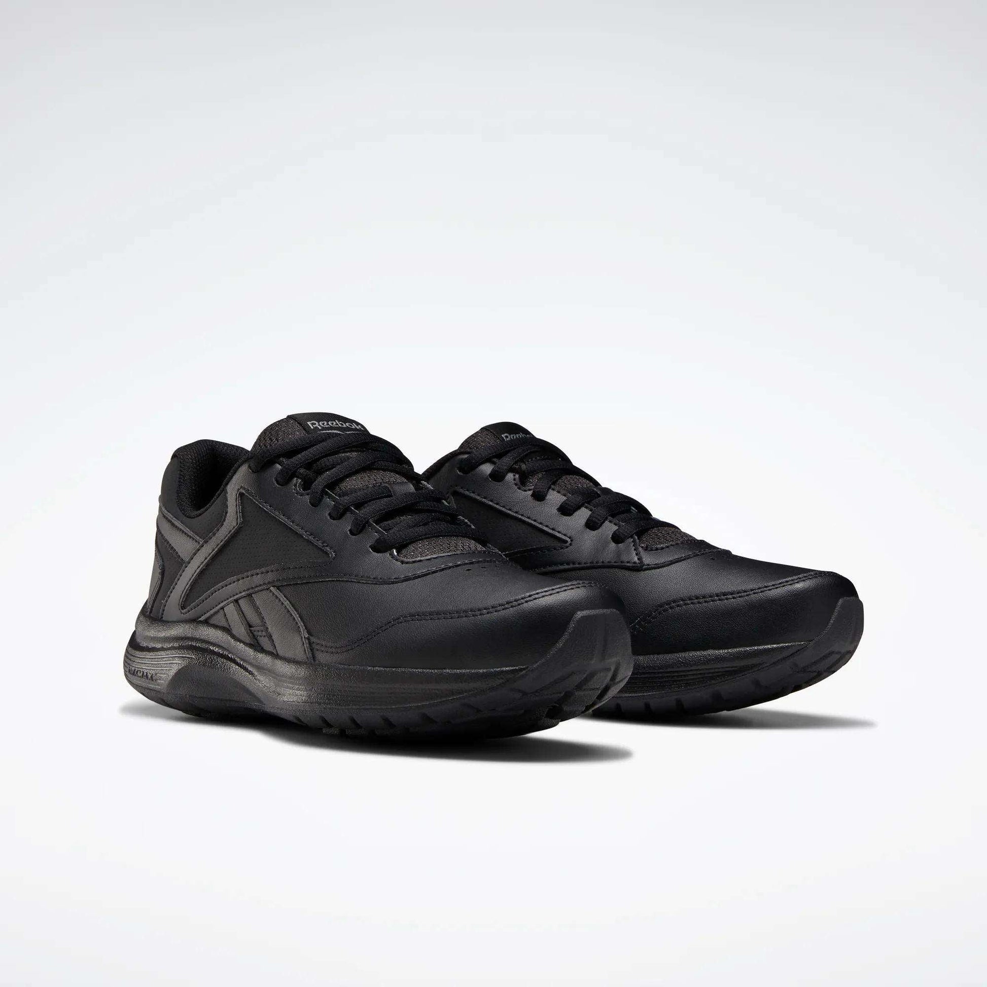A pair of Reebok Women's Walk Ultra 7 DMX Max Walking Shoes in black, designed with DMX cushioning for all-day comfort.