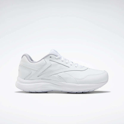The Women's Walk Ultra 7 DMX Max Walking Shoes by Reebok, shown in side profile with sleek white design and subtle stitching against a plain background, feature DMX cushioning for all-day walking comfort.