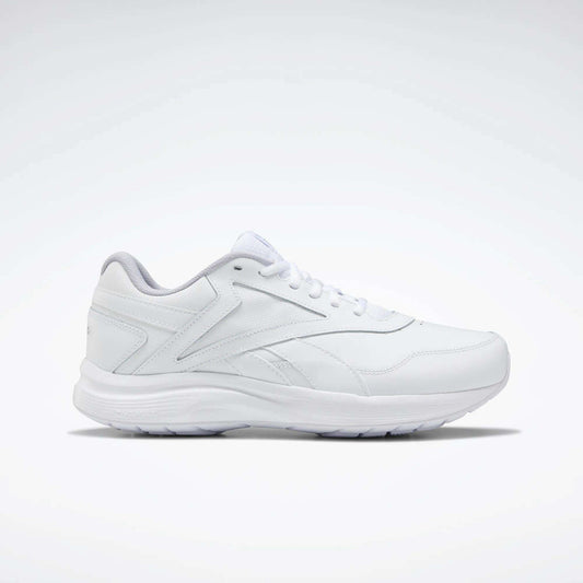 The Women's Walk Ultra 7 DMX Max Walking Shoes by Reebok, shown in side profile with sleek white design and subtle stitching against a plain background, feature DMX cushioning for all-day walking comfort.