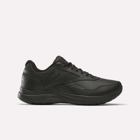 The Reebok Walk Ultra 7 DMX Max Walking Shoes are black, low-top sneakers with lace-up closure and a textured sole featuring DMX cushioning, shown in side profile on a plain white background.