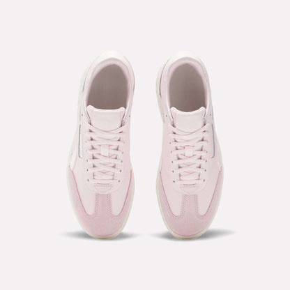 The Reebok Campio XT Double Shoes - Big Kids are stylish pink and white retro sneakers, perfect for girls.