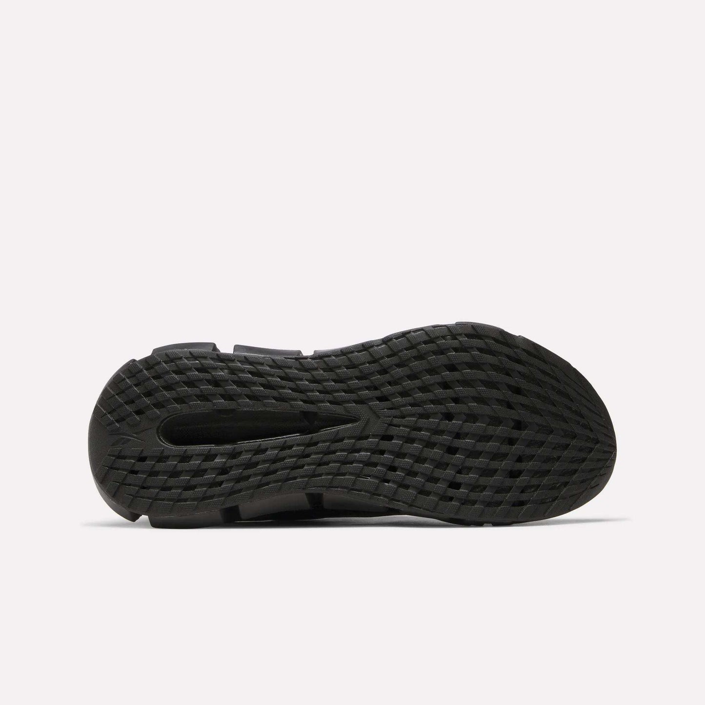 The image shows the bottom view of a black Reebok Men's FloatZig 2 Running Shoe outsole with a grid-like textured tread for grip and energy-returning cushioning, all set against a plain white background.