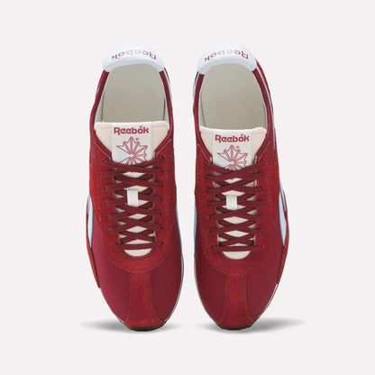 A pair of Reebok R400 Shoes in red with white accents and laces, seen from above. The sneakers display the Reebok logo and a red maple leaf emblem on the tongue.