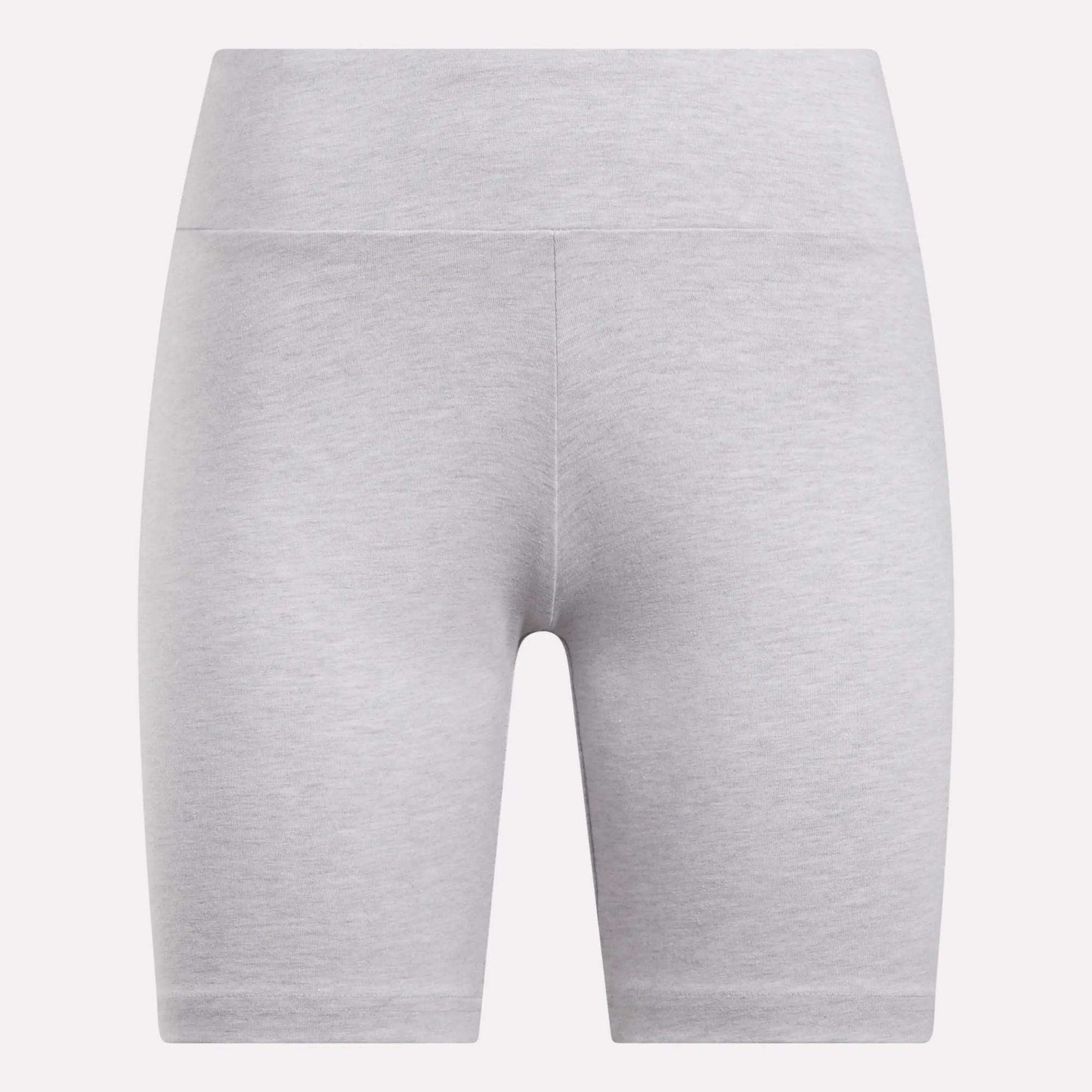 The Reebok Women's Small Logo Cycle Shorts are light gray and high-waisted, crafted from smooth, stretchy fabric with a seamless look against a plain white background. They feature a subtle design with no prominent logos or patterns.