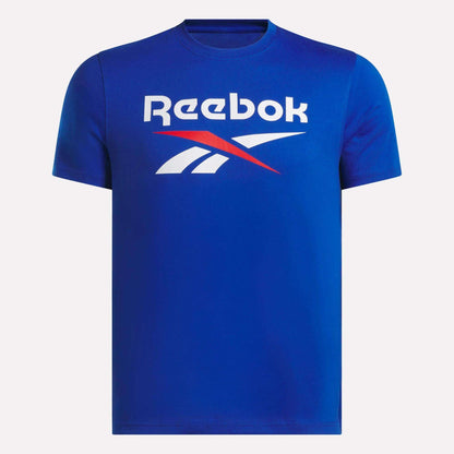 The Reebok Men's Logo Crewneck T-Shirt, in blue cotton, features a bold white and red Vector logo with text on the chest, shown against a plain white background.