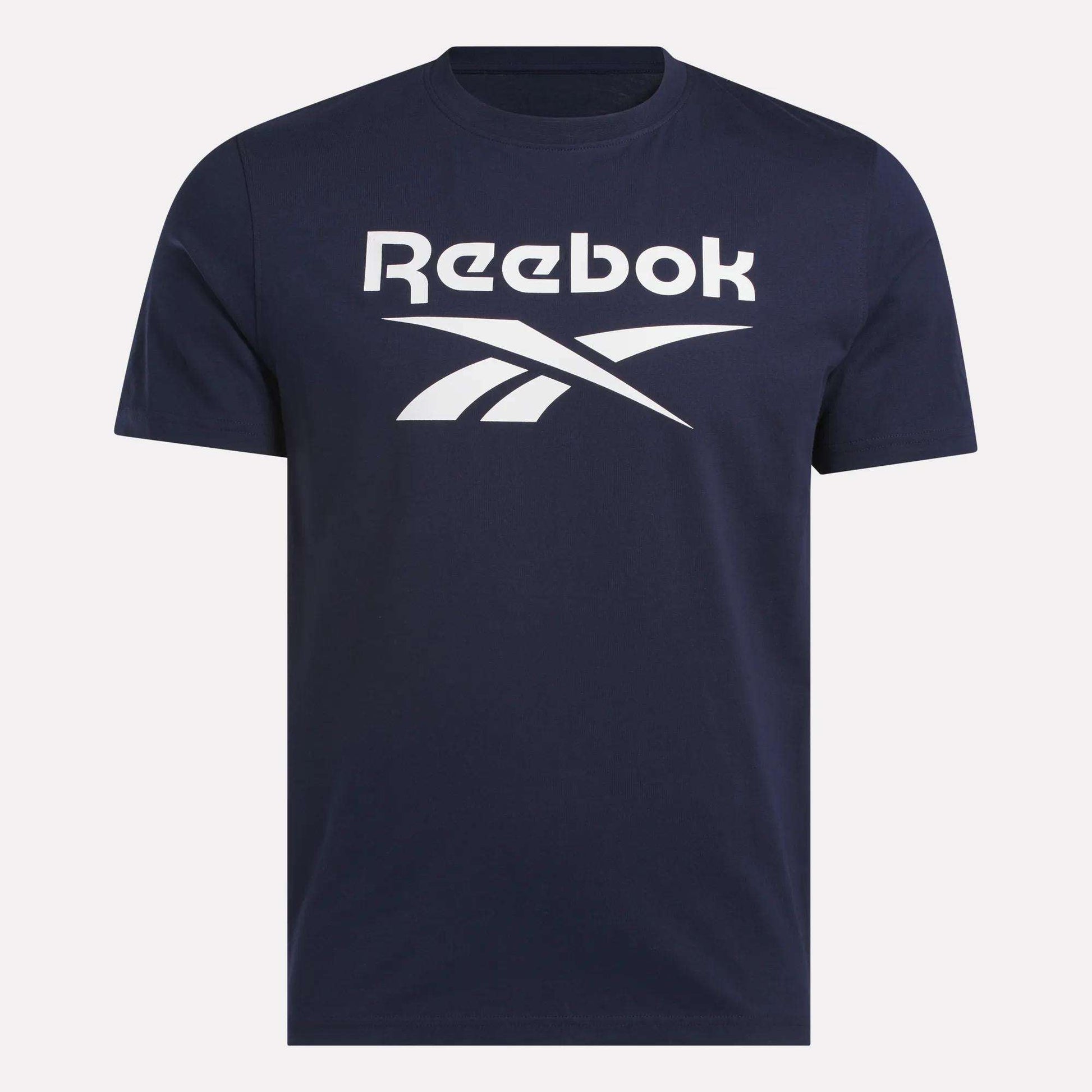 The Reebok Men's Big Logo Crewneck Short Sleeve Tee in navy features a white Reebok logo and stylized text across the chest, with short sleeves and a comfortable crew neckline.