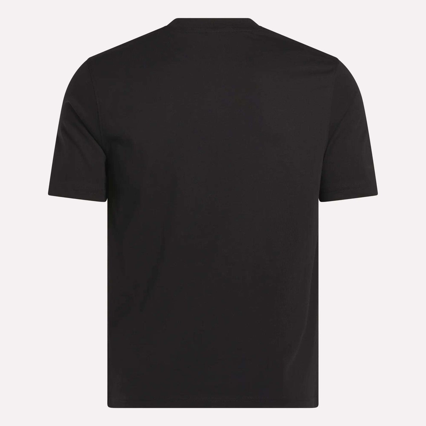 The Reebok Men's Small Logo Crewneck Short Sleeve T-Shirt is shown from the back in soft black cotton jersey. It features a simple crew neckline and minimal visible logos or designs, set against a light background.