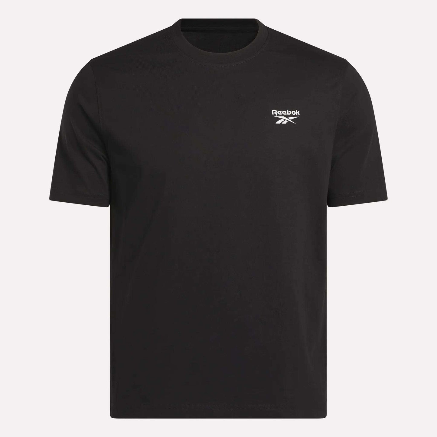 The Reebok Men's Small Logo Crewneck Short Sleeve T-Shirt is a plain black cotton jersey tee, featuring short sleeves and a small white Reebok logo on the upper left chest, shown against a light background.