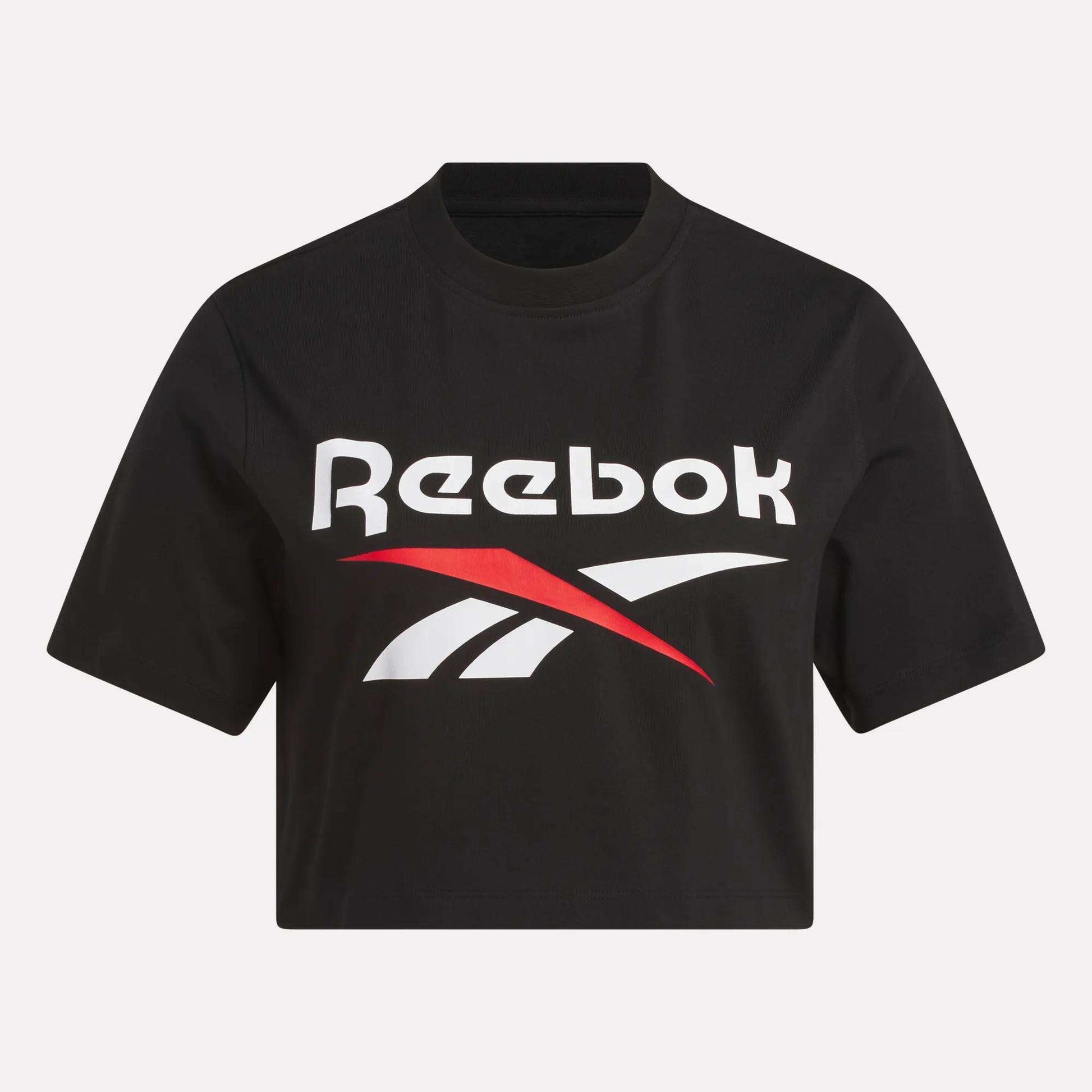 The Reebok Women's Two-Color Logo Crew Cropped Short Sleeve Tee is a black women's t-shirt with short sleeves, featuring a bold white logo and red-white design on the front—ideal for sporty, standout style.
