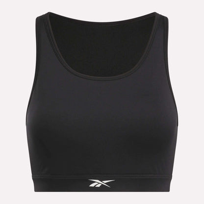 The Women's Core High-Impact Bra by Reebok is black with a scoop neckline, white logo centered on the lower band, and made from sweat-wicking fabric, shown against a plain light background.
