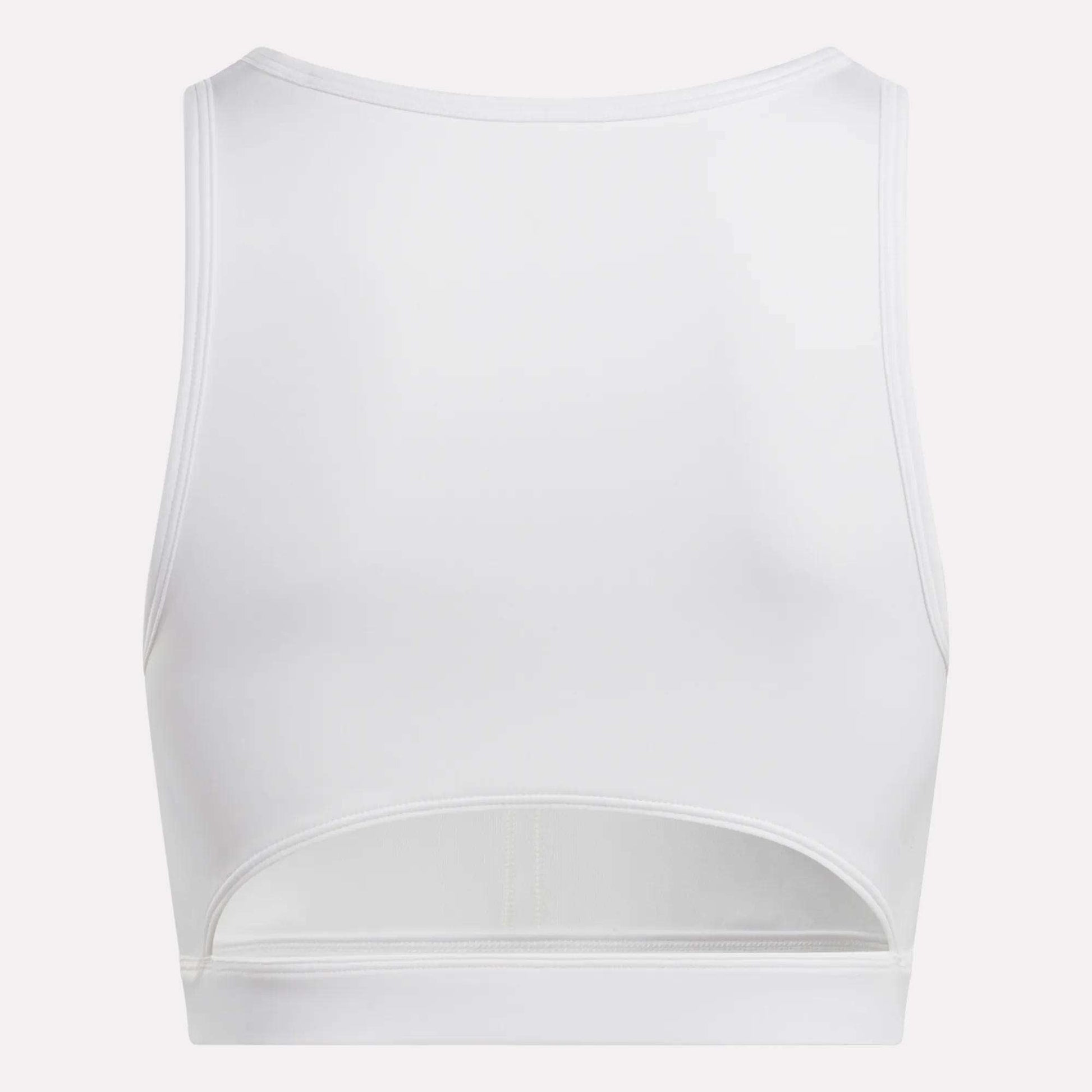 The Reebok Women's Core High-Impact Bra is a white, sleeveless sports bra with a high neckline and horizontal lower-back cut-out. Made with sweat-wicking fabric to keep you cool and dry during intense workouts. Shown from the back.