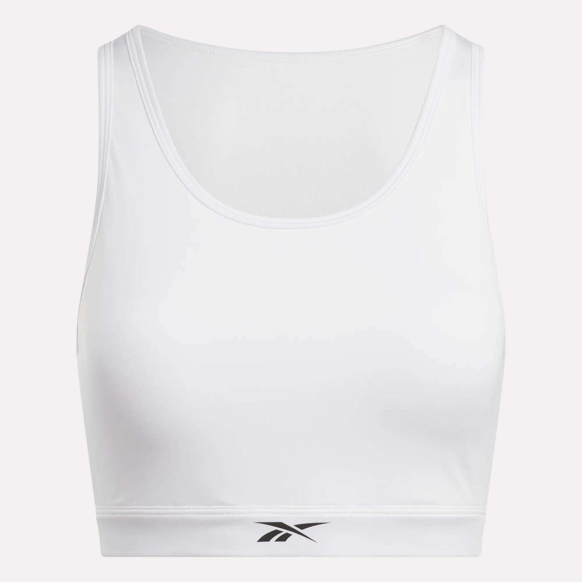 The Reebok Women's Core High-Impact Bra features a scoop neckline, fitted sweat-wicking design, and a small black logo on the front band to keep you comfortable and supported during intense workouts.
