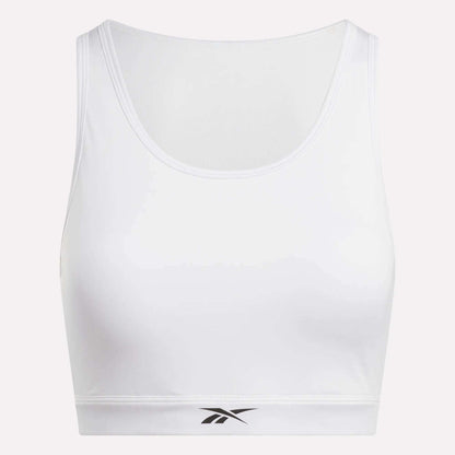 The Reebok Women's Core High-Impact Bra features a scoop neckline, fitted sweat-wicking design, and a small black logo on the front band to keep you comfortable and supported during intense workouts.