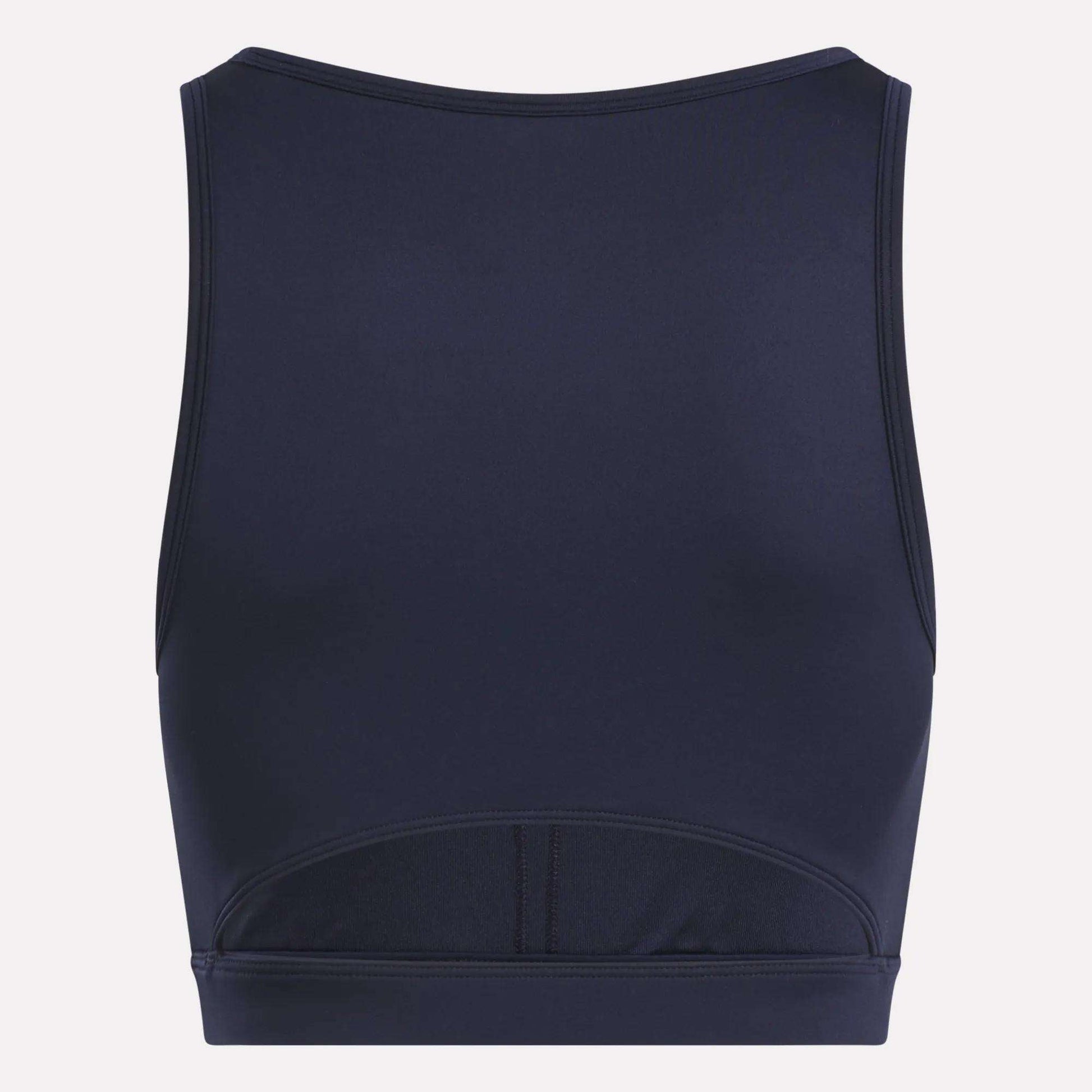 The Reebok Women's Core High-Impact Bra is shown from the back in navy blue, featuring a high neckline, sleeveless design, sweat-wicking fitted fabric, and subtle seam details—ideal for high-impact workouts.