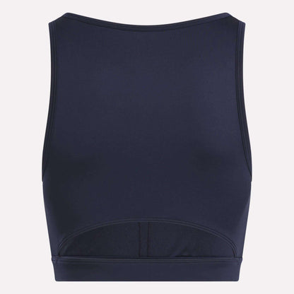 The Reebok Women's Core High-Impact Bra is shown from the back in navy blue, featuring a high neckline, sleeveless design, sweat-wicking fitted fabric, and subtle seam details—ideal for high-impact workouts.