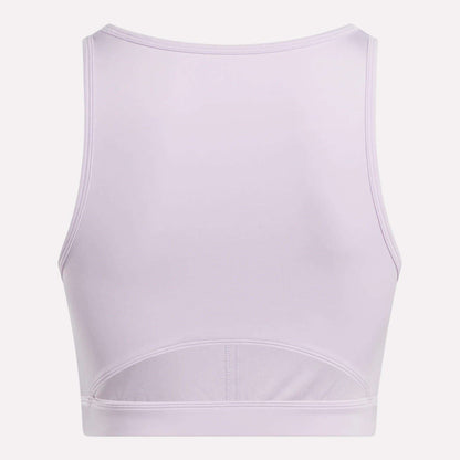 Back view of the Reebok Women's Core High-Impact Bra in light lavender, featuring a racerback and subtle lower-back seams. Smooth, stretchy, sweat-wicking fabric makes it perfect for intense training sessions.