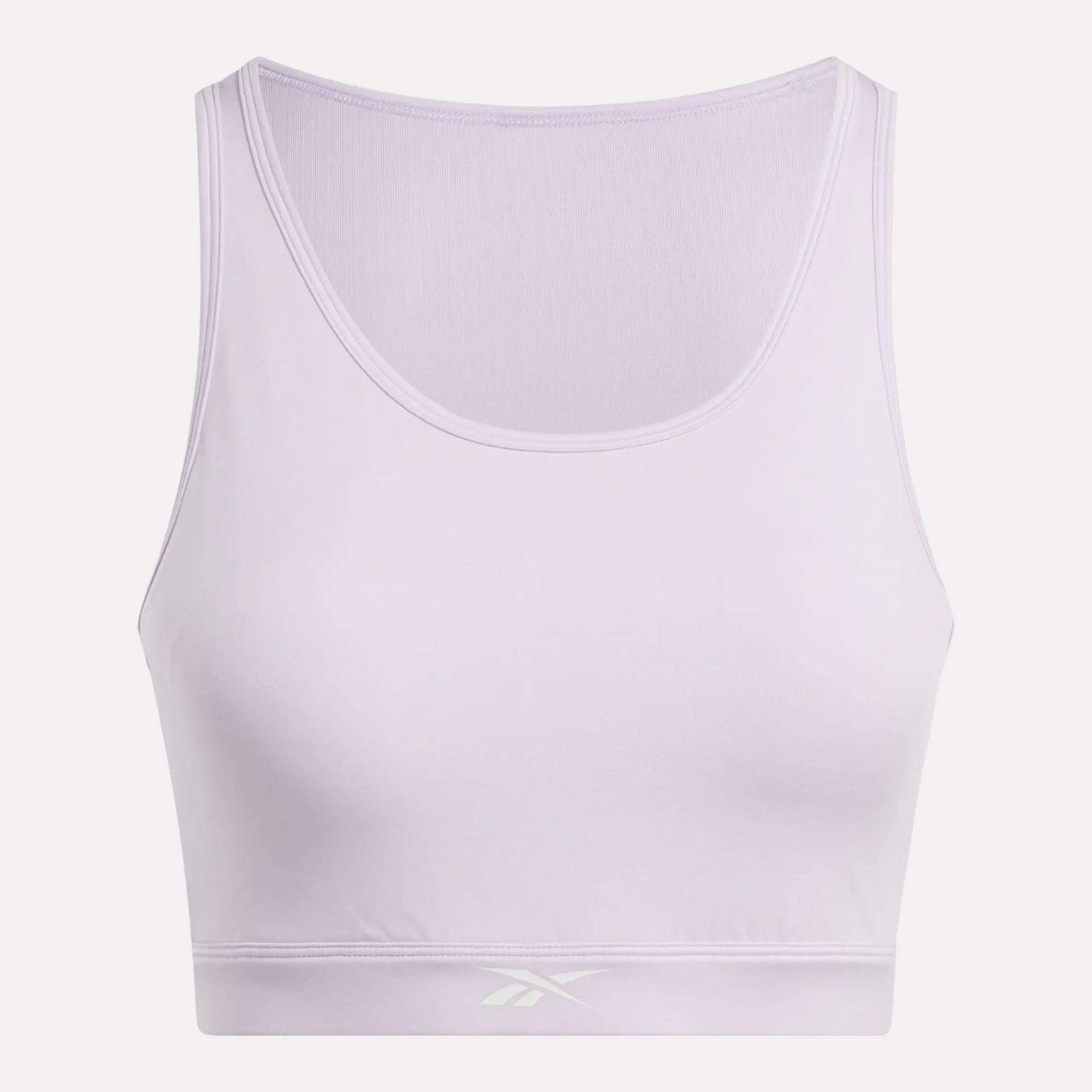 The Women's Core High-Impact Bra by Reebok is a light purple sleeveless crop top with a scoop neckline and subtle front waistband logo. Featuring sweat-wicking fabric, it's ideal for high-impact training. Shown on a white background.