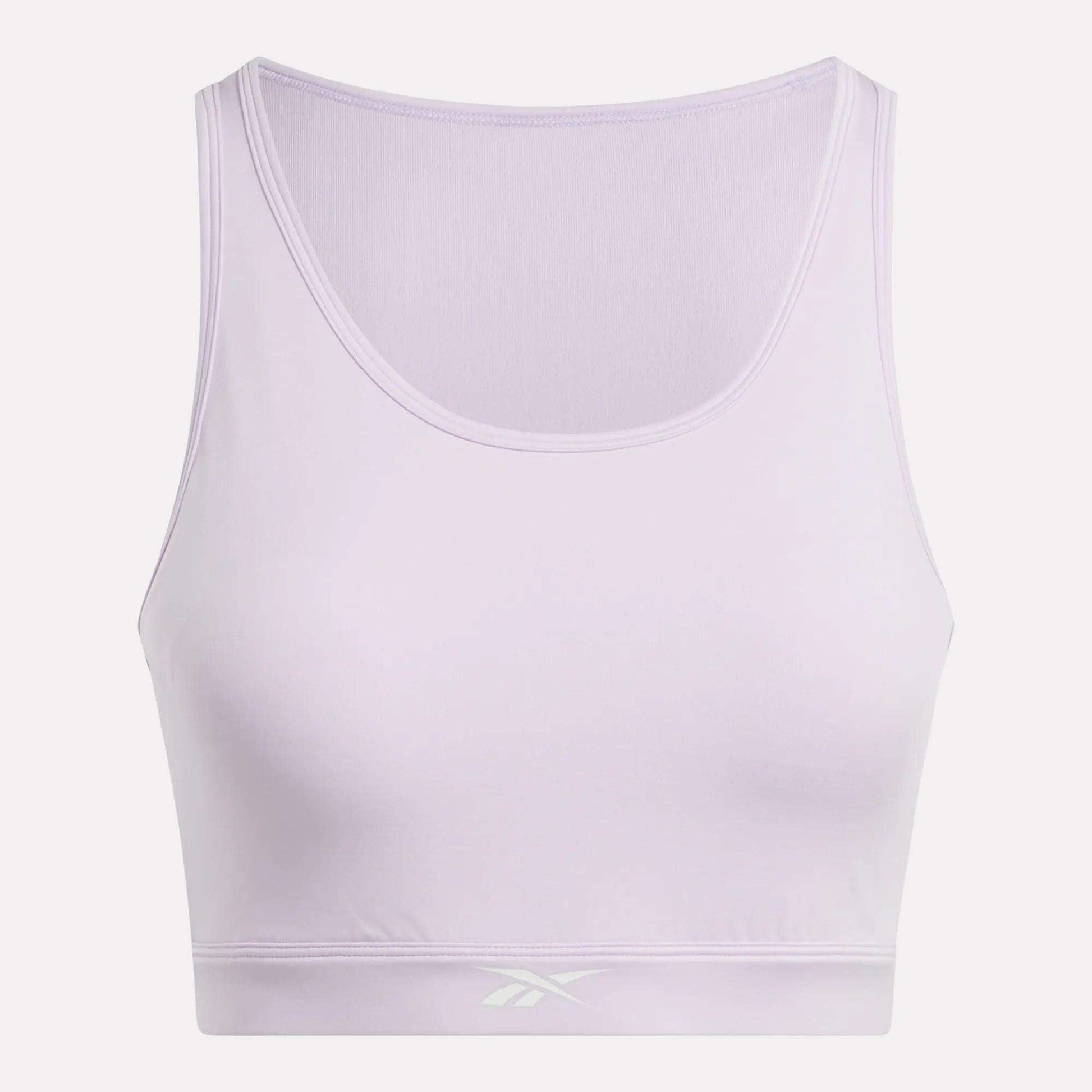 The Women's Core High-Impact Bra by Reebok is a light purple sleeveless crop top with a scoop neckline and subtle front waistband logo. Featuring sweat-wicking fabric, it's ideal for high-impact training. Shown on a white background.