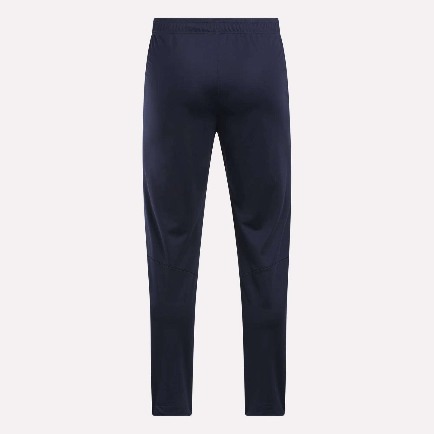 Men's Train Knit Pants by Reebok in navy blue, featuring an elastic waistband, displayed flat and facing forward against a plain light background.