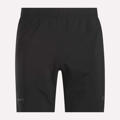 Reebok Men's Athlete Speed Shorts are black athletic training shorts with an elastic waistband, subtle Reebok logos on both legs, and a minimalist RBK-DRY design for comfort and breathability. No visible pockets or extra embellishments.