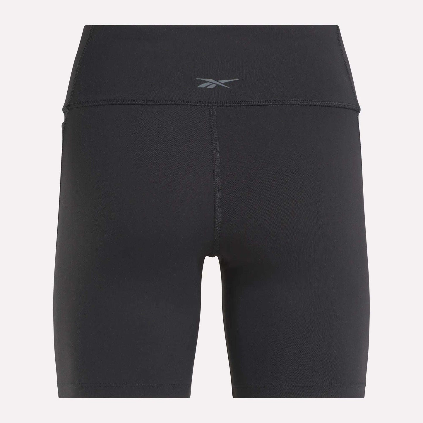 Back view of Reebok Women's Lux High-Rise Bike Shorts in black with a small waistband logo. Crafted from stretchy RBK-DRY fabric and designed with flatlock stitching for comfort and performance.