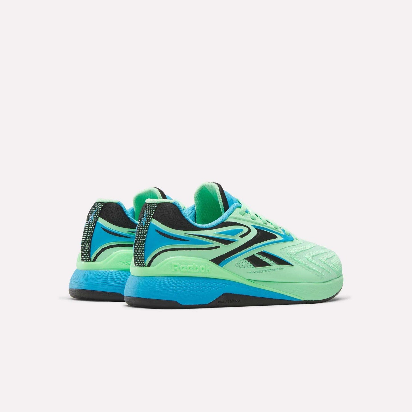 A pair of Reebok Nano X5 Edge Training Shoes in vibrant green with blue and black accents, featuring Flexweave technology, shown from back and side angles on a plain white background.