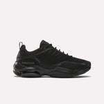 The Reebok DMX Series 3000 Shoes in black have a chunky sole, mesh and synthetic overlays, lace-up closure, and DMX moving air tech for comfort, shown in side view against a plain white background.