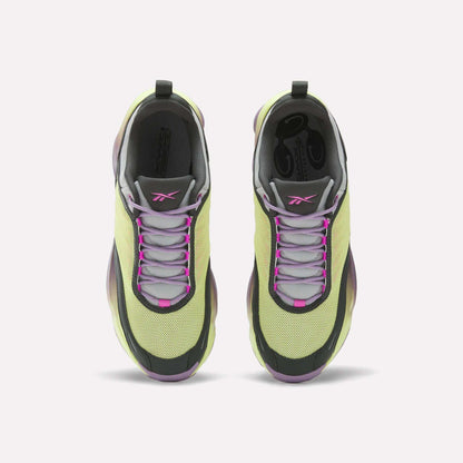 The Reebok DMX Series 3000 Shoes feature light green mesh uppers with purple and pink accents, gray laces, and black trim—offering comfortable wear with advanced DMX moving air technology.