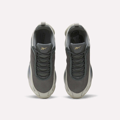 Top view of Reebok DMX Series 3000 Shoes in gray, with white soles, mesh uppers, and a gold logo on the tongues. Features DMX moving air technology for comfort. Displayed on a plain white background.