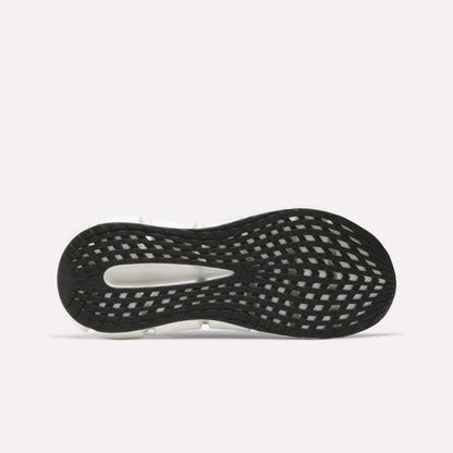 The underside of the Reebok Men's FloatZig 2 Running Shoes features a black and white sole with a textured, grid-like tread pattern and energy-returning cushioning, showcased against a plain white background.