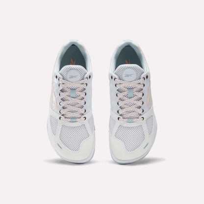 Reebok Women's Nano 2.0 Training Shoes feature white mesh uppers, light blue interiors, and light laces—designed for functional fitness and shown top-down on a plain white background.