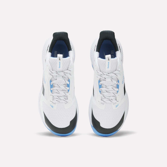 The Reebok Nano Golf Shoes are white athletic sneakers with black and blue accents, seen from above on a white background. They feature white laces, a FlexWeave mesh upper for modern style, and enhanced performance foam for comfort.